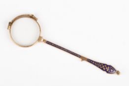 A pair of Victorian French gilt metal and enamel lorgnettesthe lozenge shaped handle inset with