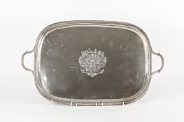 A large George III silver armourial trayhallmarked London 1809, engraved with a large central crest