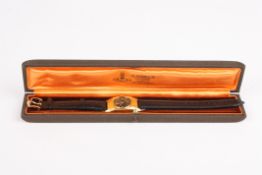 An E. Gübelin 18ct gold Art Deco design dress wrist watchthe black dial signed E. Gübelin