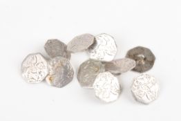 An unusual set of ten late 19th century buttonspossibly Russian?of octagonal form with engraved