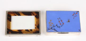 A George V silver and enamel boxhallmarked Birmingham 1928, the top decorated with a Chinoisserie