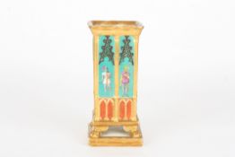 A 19th century French Darte porcelain Gothic design spill vaseof square form, painted with full