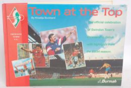 FOOTBALL; Town At The Top - Swindon Town book - signed by Andy Rowland, Steve Cottle and others.