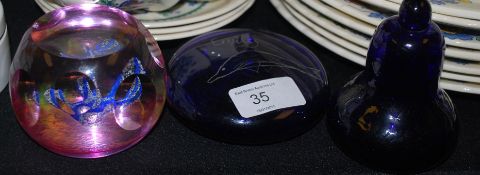 Three glass paper weights to include Cai