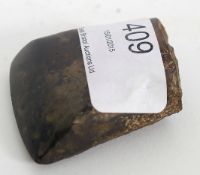 A Neolithic axe head. Measures 4.5cms hi