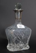 A silver hallmarked topped cut glass dri