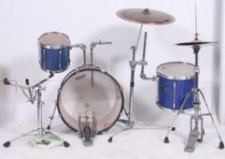A Pearl Drum kit comprising Bass drum, s
