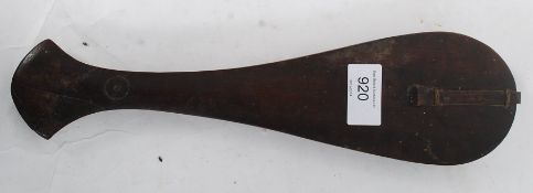 A pair of Chinese scales in a wooden swi