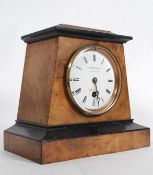 A Victorian walnut cased mantel clock by
