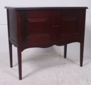 An Edwardian mahogany side / hall cabine