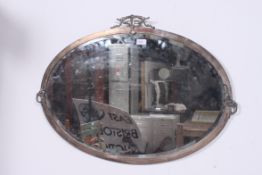 A 20th century silver plate surrounded w