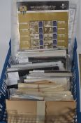 A quantity of stamp presentation packs a