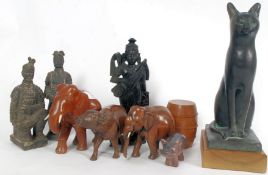 A collection of wooden animals to includ