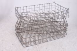 Three vintage industrial metal wirework