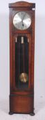 A 1930's large oak cased grandfather clo