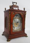 A Wuba Reproduction Mantel Clock, the ar