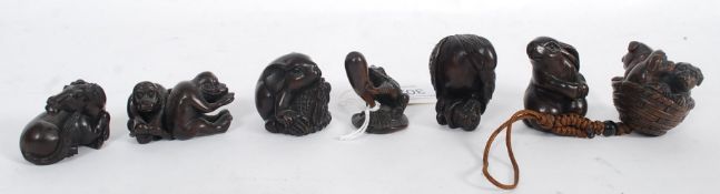 A collection of wooden  Japanese Netsuke