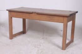 A mid 20th century vintage beech twin se