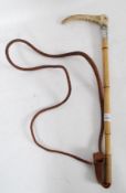 A silver hallmarked bamboo, horn and lea