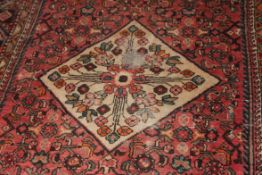An early 20th century handwoven rug havi