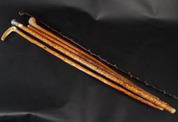 A silver knop topped walking stick on ta