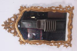 A large Victorian style gilt edged mirro