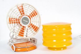 A boxed Pifco orange retro table fan alo