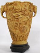 A large Indian / Chinese resin twin hand