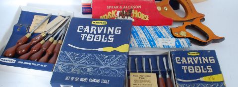 A box of assorted vintage tools to inclu