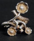 A hallmarked silver ladies ring in the f
