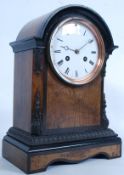 A Victorian walnut cased bracket clock b