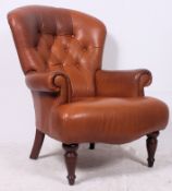 A good tan leather Chesterfield style ar