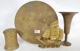 A collection of brass wares to include a