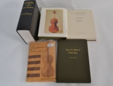 A collection of books on violins to incl
