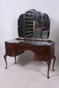 A 20th century walnut Queen Anne dressin