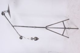 A mid 20th century polished steel survey