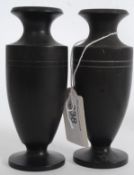 A pair of early 20th century ebony minia