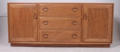 An original Ercol Windsor pattern elm wo