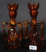 A good pair of Edwardian amber glass lus