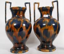 A pair of large drip glaze studio twin h