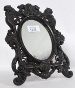 A late 19th century  bois durci easel dr