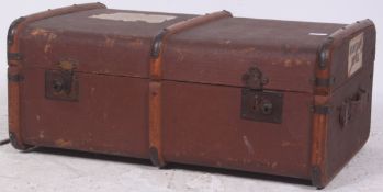 An early 20th century canvas and wooden