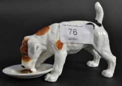 A Royal Doulton china figurine of a dog