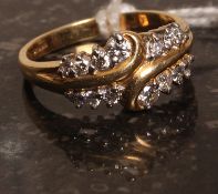 An 18k gold diamond ring 70pts. Weight 4