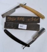 A pair cut throat vintage razors both be