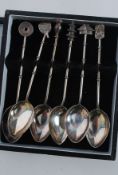A  set of sterling silver Chinese spoons
