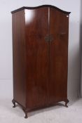 A 20th century walnut Queen Anne wardrob