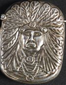 A white metal likely silver pressed Indi