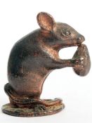 A miniature bronze metal mouse with WRL