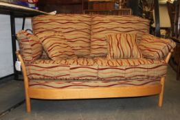 A large Ercol Renaissance light elm thre